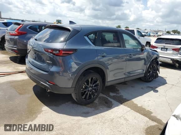 2023 Mazda CX-5 S Carbon Edition with VIN JM3KFBCM3P0215682, listed as a Copart auction lot 63948185 with 14,075 mi miles and Salvage title. Bid and sale history available at DreamBid. Image 3.