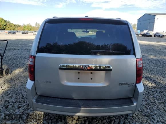2010 Dodge Grand Caravan SXT z VIN 2D4RN5D17AR434368, wystawiony jako Copart lot #84520975 z przebiegiem 186 103 mil mil oraz Szkoda całkowita • Salvage title. Historia ofert i sprzedaży dostępna na DreamBid. Obrazek 6.