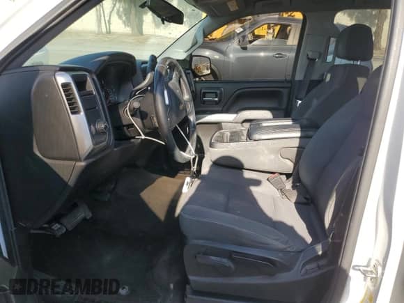 2015 Chevrolet Silverado 1500 LT z VIN 1GCRCREH7FZ355334, wystawiony jako Copart lot #66734945 z przebiegiem Nie podano mil oraz Szkoda całkowita • Salvage title. Historia ofert i sprzedaży dostępna na DreamBid. Obrazek 7.