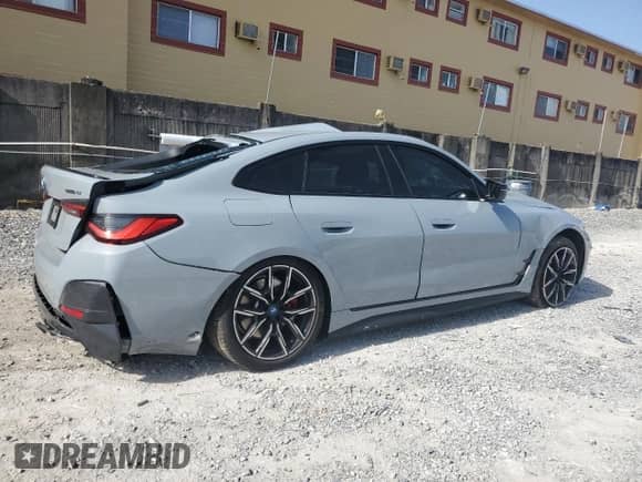 2024 BMW i4 eDrive40 with VIN WBY73AW05RFT21513, listed as a Copart auction lot 66119785 with 15,130 mi miles and Salvage title. Bid and sale history available at DreamBid. Image 3.