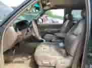 2001 Toyota Tundra Limited z VIN 5TBBT48101S167986, wystawiony jako Copart lot #64989255 z przebiegiem 217 919 mil mil oraz Czysty tytuł • Clean title. Historia ofert i sprzedaży dostępna na DreamBid. Obrazek 7.