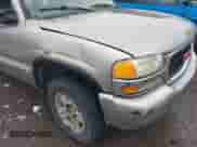2000 GMC Sierra 1500 SLE z VIN 1GTEK19T0YE186897, wystawiony jako IAAI lot #42636565 z przebiegiem 229 310 mil mil oraz . Historia ofert i sprzedaży dostępna na DreamBid. Obrazek 17.