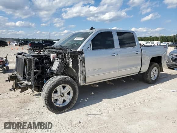 2018 Chevrolet Silverado 1500 LTZ z VIN 3GCUKSECXJG285779, wystawiony jako Copart lot #56300025 z przebiegiem 102 316 mil mil oraz Szkoda całkowita • Salvage title. Historia ofert i sprzedaży dostępna na DreamBid. Obrazek 1.