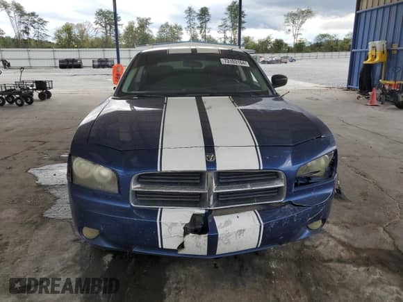 2009 Dodge Charger SXT с VIN 2B3KA33V79H514212, выставлен на аукционе Copart как лот 73103164 с пробегом 211 375 миль миль и Списание • Salvage title. История ставок и продаж доступна на DreamBid. Изображение 5.