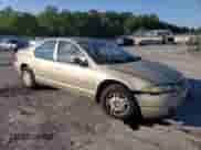 1999 Dodge Stratus with VIN 1B3EJ46X0XN684268, listed as a Copart auction lot 70312664 with 140,711 mi miles and Salvage title. Bid and sale history available at DreamBid. Image 4.