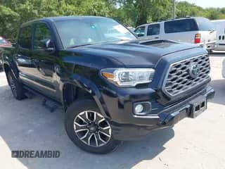 2021 Toyota Tacoma SR with VIN 3TMCZ5AN1MM425644, listed as a IAAI auction lot 43030368 with 31,573 mi miles and . Bid and sale history available at DreamBid. Image 1.