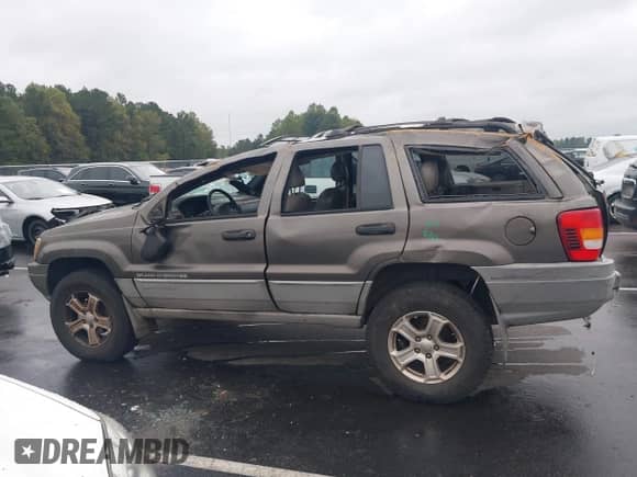 1999 Jeep Grand Cherokee Laredo с VIN 1J4G258S6XC717016, выставлен на аукционе IAAI как лот 43329768 с пробегом 239 308 миль миль и . История ставок и продаж доступна на DreamBid. Изображение 14.