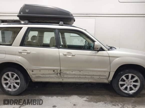 2006 Subaru Forester X с VIN JF1SG65696H700586, выставлен на аукционе IAAI как лот 42478232 с пробегом 140 447 миль миль и . История ставок и продаж доступна на DreamBid. Изображение 13.