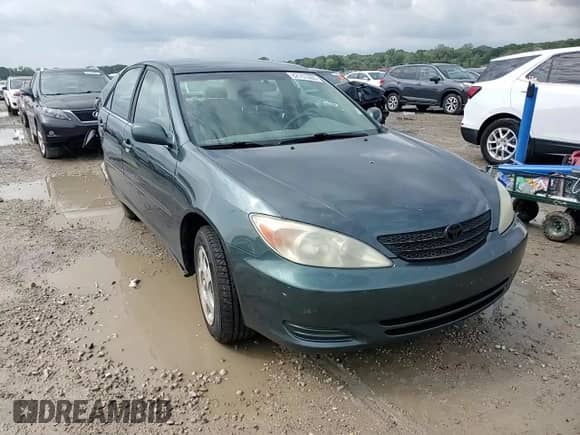 2002 Toyota Camry LE z VIN 4T1BE32K32U543876, wystawiony jako Copart lot #82151065 z przebiegiem Nie podano mil oraz Szkoda całkowita • Salvage title. Historia ofert i sprzedaży dostępna na DreamBid. Obrazek 13.