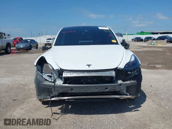2023 Tesla Model Y Long Range z VIN 7SAYGDEE0PA178495, wystawiony jako IAAI lot #42507571 z przebiegiem 55 840 mil mil oraz . Historia ofert i sprzedaży dostępna na DreamBid. Obrazek 12.