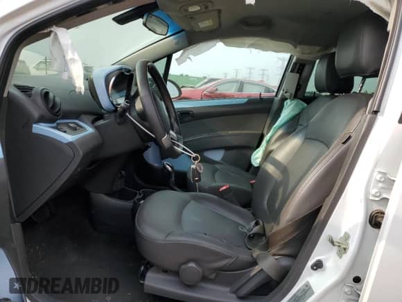 2014 Chevrolet Spark LT с VIN KL8CL6S00EC400630, выставлен на аукционе Copart как лот 67138095 с пробегом 48 631 миль миль и Списание • Salvage title. История ставок и продаж доступна на DreamBid. Изображение 7.