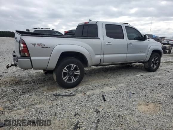 2013 Toyota Tacoma with VIN 3TMMU4FN6DM050274, listed as a Copart auction lot 84457385 with 171,272 mi miles and Salvage title. Bid and sale history available at DreamBid. Image 3.