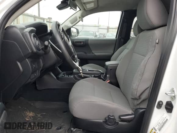 2023 Toyota Tacoma SR z VIN 3TYRZ5CN9PT026979, wystawiony jako Copart lot #85715965 z przebiegiem 70 943 mil mil oraz Szkoda całkowita • Salvage title. Historia ofert i sprzedaży dostępna na DreamBid. Obrazek 7.