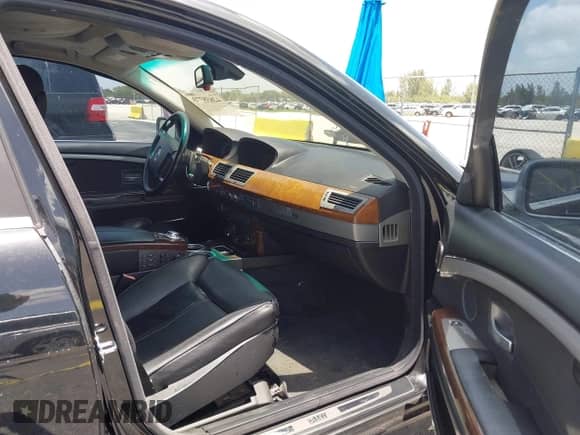 2004 BMW 7 Series 745Li with VIN WBAGN63494DS46767, listed as a IAAI auction lot 42838773 with 185,396 mi miles and . Bid and sale history available at DreamBid. Image 5.