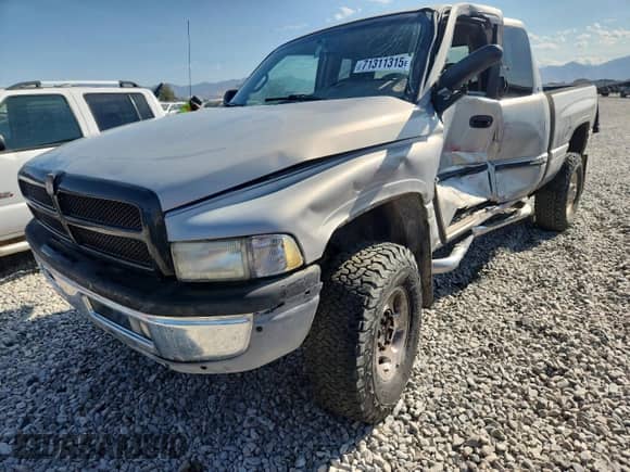 2000 Dodge 2500 with VIN 3B7KF2361YG115040, listed as a Copart auction lot 71311315 with Not provided miles and Salvage title. Bid and sale history available at DreamBid. Image 1.