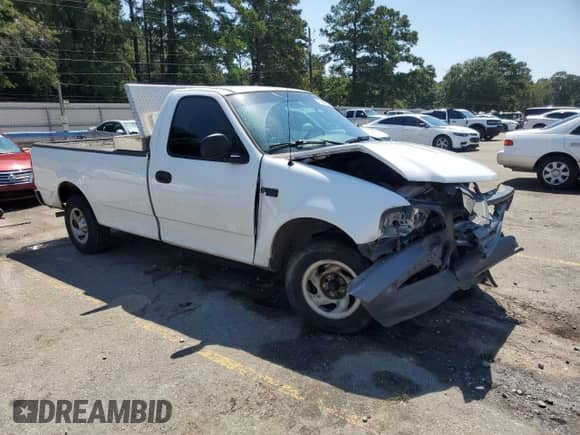 2003 Ford F-150 XL with VIN 1FTRF17273NB25569, listed as a Copart auction lot 71540805 with 173,359 mi miles and Salvage title. Bid and sale history available at DreamBid. Image 4.