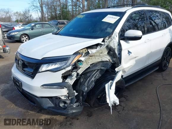 2021 Honda Pilot Black Edition z VIN 5FNYF6H71MB030752, wystawiony jako IAAI lot #41898089 z przebiegiem 87 840 mil mil oraz . Historia ofert i sprzedaży dostępna na DreamBid. Obrazek 6.