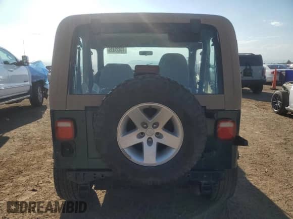 1995 Jeep Wrangler S with VIN 1J4FY19P1SP202309, listed as a Copart auction lot 69622435 with 187,977 mi miles and Clean title. Bid and sale history available at DreamBid. Image 6.