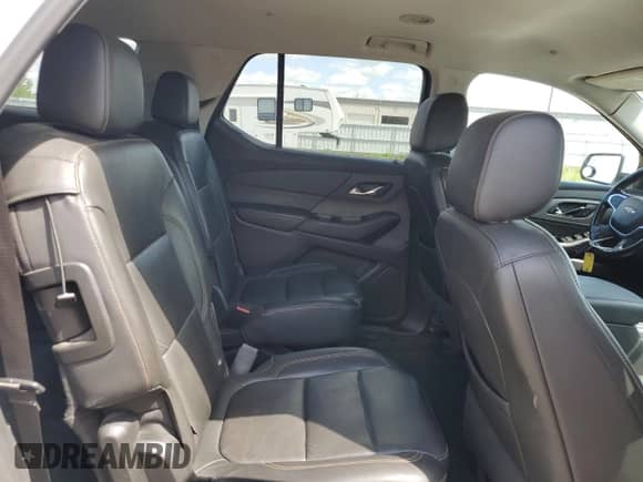 2021 Chevrolet Traverse LT с VIN 1GNEVHKW8MJ227208, выставлен на аукционе Copart как лот 68551415 с пробегом 174 395 миль миль и Чистый • Clean title. История ставок и продаж доступна на DreamBid. Изображение 11.