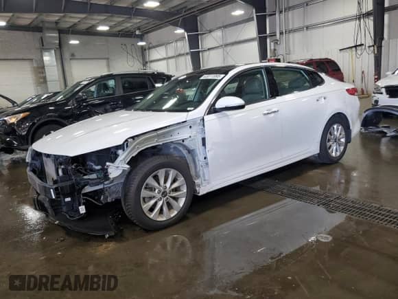 2016 Kia Optima EX with VIN 5XXGU4L36GG056307, listed as a Copart auction lot 63011895 with 69,738 mi miles and Salvage title. Bid and sale history available at DreamBid. Image 1.