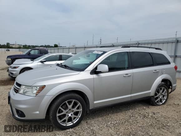 2013 Dodge Journey R/T Rallye with VIN 3C4PDDEG1DT661772, listed as a Copart auction lot 67354975 with 189,440 mi miles and Salvage title. Bid and sale history available at DreamBid. Image 1.