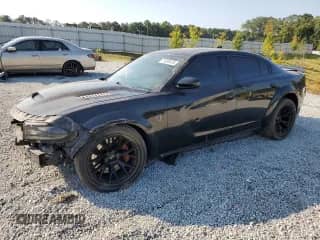 2021 Dodge Charger SRT Hellcat Redeye Widebody с VIN 2C3CDXL95MH563717, выставлен на аукционе Copart как лот 71633475 с пробегом 63 608 миль миль и Списание • Salvage title. История ставок и продаж доступна на DreamBid. Изображение 1.