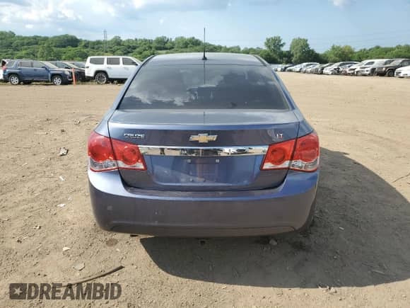 2013 Chevrolet Cruze LT with VIN 1G1PK5SB2D7273404, listed as a Copart auction lot 63574575 with 187,100 mi miles and Salvage title. Bid and sale history available at DreamBid. Image 6.