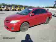 2011 Toyota Corolla L with VIN JTDBU4EE2BJ101398, listed as a Copart auction lot 86776935 with 216,840 mi miles and Clean title. Bid and sale history available at DreamBid. Image 1.