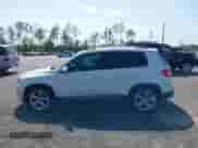 2011 Volkswagen Tiguan S with VIN WVGAV7AX5BW549683, listed as a IAAI auction lot 42131622 with 121,306 mi miles and . Bid and sale history available at DreamBid. Image 14.