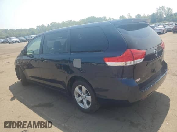 2012 Toyota Sienna with VIN 5TDZK3DC4CS237227, listed as a Copart auction lot 68947005 with 219,993 mi miles and Salvage title. Bid and sale history available at DreamBid. Image 2.