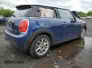 2016 MINI Hardtop with VIN WMWXP5C58G3B76219, listed as a Copart auction lot 57879225 with 94,245 mi miles and Salvage title. Bid and sale history available at DreamBid. Image 3.