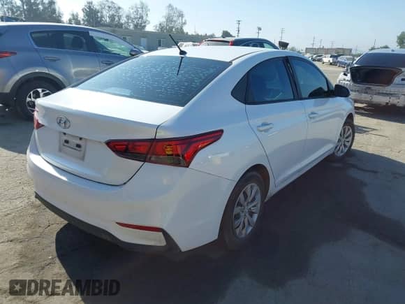 2020 Hyundai Accent SE with VIN 3KPC24A69LE121204, listed as a IAAI auction lot 43005962 with 7,015 mi miles and . Bid and sale history available at DreamBid. Image 4.
