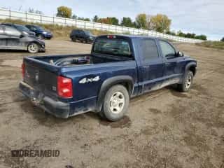 2005 Dodge Dakota ST z VIN 1D7HW28N85S136973, wystawiony jako Copart lot #86591855 z przebiegiem Nie podano mil oraz Czysty tytuł • Clean title. Historia ofert i sprzedaży dostępna na DreamBid. Obrazek 3.