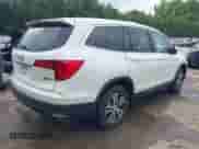 2018 Honda Pilot EX-L z VIN 5FNYF6H52JB057100, wystawiony jako IAAI lot #42775886 z przebiegiem 89 390 mil mil oraz . Historia ofert i sprzedaży dostępna na DreamBid. Obrazek 4.