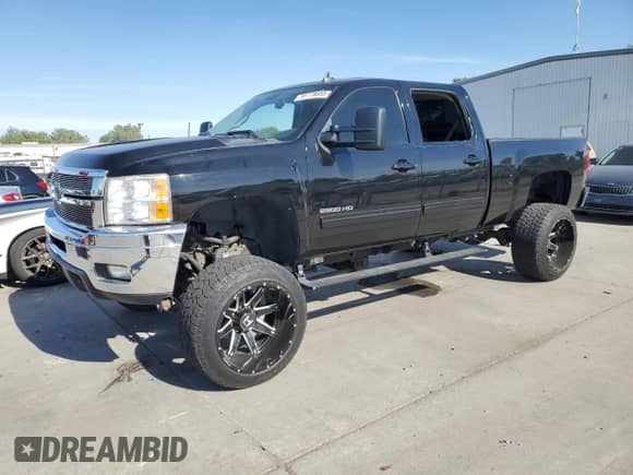 2011 Chevrolet Silverado 2500HD LTZ with VIN 1GC1KYC87BF143073, listed as a Copart auction lot 55778655 with 75,657 mi miles and Salvage title. Bid and sale history available at DreamBid. Image 1.