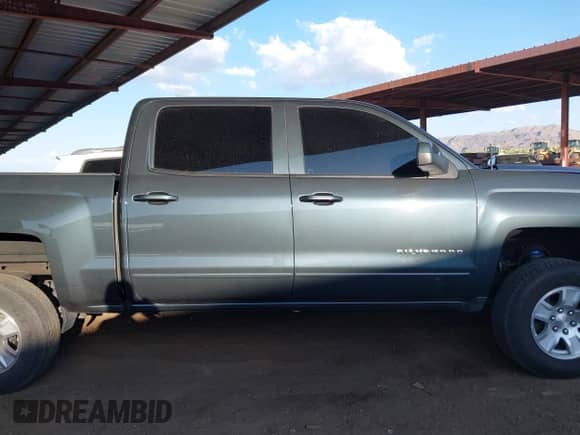 2018 Chevrolet Silverado 1500 LT with VIN 3GCUKREC2JG234849, listed as a IAAI auction lot 42432401 with 52,087 mi miles and . Bid and sale history available at DreamBid. Image 13.