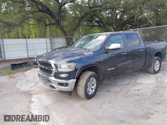 2020 Ram 1500 Laramie z VIN 1C6SRFRT4LN352298, wystawiony jako IAAI lot #43097857 z przebiegiem 59 894 mil mil oraz . Historia ofert i sprzedaży dostępna na DreamBid. Obrazek 17.