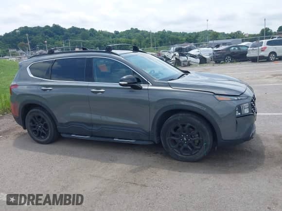 2022 Hyundai Santa Fe XRT with VIN 5NMS64AJ2NH449628, listed as a IAAI auction lot 42729354 with 47,854 mi miles and . Bid and sale history available at DreamBid. Image 13.