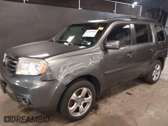 2013 Honda Pilot EX-L with VIN 5FNYF4H74DB055262, listed as a IAAI auction lot 42515947 with 229,037 mi miles and . Bid and sale history available at DreamBid. Image 6.