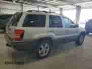 2004 Jeep Grand Cherokee Laredo with VIN 1J4GW48J64C279213, listed as a Copart auction lot 69077445 with 170,595 mi miles and Salvage title. Bid and sale history available at DreamBid. Image 3.