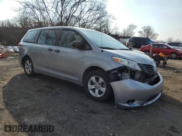 2014 Toyota Sienna L with VIN 5TDZK3DC2ES458053, listed as a Copart auction lot 43503505 with 100,656 mi miles and Salvage title. Bid and sale history available at DreamBid. Image 4.
