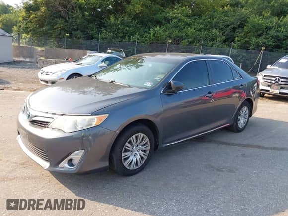 2013 Toyota Camry LE z VIN 4T1BD1FK5DU074343, wystawiony jako IAAI lot #42908273 z przebiegiem 180 827 mil mil oraz . Historia ofert i sprzedaży dostępna na DreamBid. Obrazek 17.