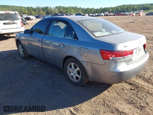 2006 Hyundai Sonata GLS z VIN 5NPEU46C76H111739, wystawiony jako IAAI lot #43448443 z przebiegiem 214 858 mil mil oraz . Historia ofert i sprzedaży dostępna na DreamBid. Obrazek 3.