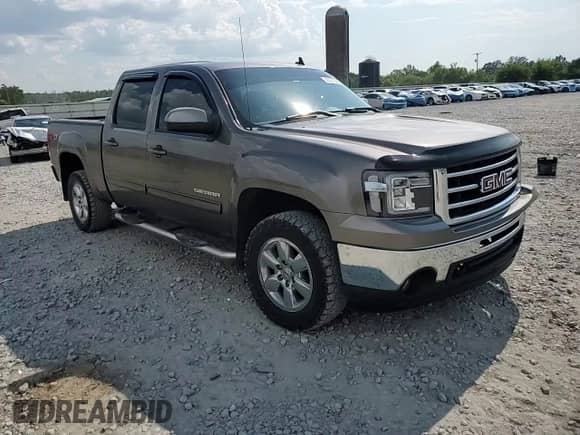 2013 GMC Sierra 1500 SLT с VIN 3GTP2WE79DG125341, выставлен на аукционе Copart как лот 69387625 с пробегом 245 621 миль миль и Списание • Salvage title. История ставок и продаж доступна на DreamBid. Изображение 13.