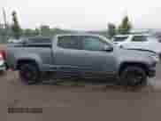 2020 Chevrolet Colorado 4WD LT with VIN 1GCGTCEN7L1235246, listed as a IAAI auction lot 42600889 with 57,012 mi miles and . Bid and sale history available at DreamBid. Image 14.
