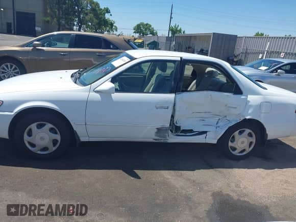 1997 Toyota Camry LE z VIN JT2BF22K6V0052184, wystawiony jako IAAI lot #42608245 z przebiegiem 188 191 mil mil oraz . Historia ofert i sprzedaży dostępna na DreamBid. Obrazek 14.