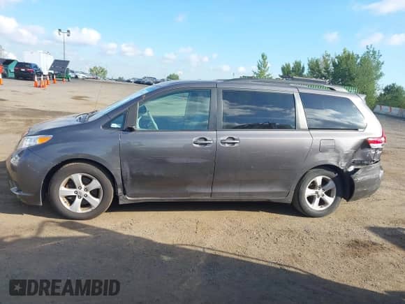 2012 Toyota Sienna LE AAS with VIN 5TDKK3DC2CS215910, listed as a IAAI auction lot 43063000 with 169,580 mi miles and . Bid and sale history available at DreamBid. Image 14.