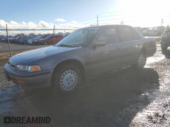 1992 Honda Accord LX z VIN JHMCB7651NC030132, wystawiony jako Copart lot #85348914 z przebiegiem 240 380 mil mil oraz Szkoda całkowita • Salvage title. Historia ofert i sprzedaży dostępna na DreamBid. Obrazek 1.