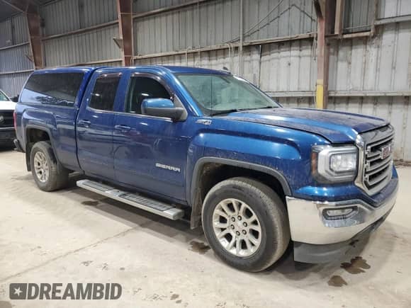 2017 GMC Sierra 1500 SLE z VIN 1GTV2MEC4HZ193075, wystawiony jako Copart lot #69818515 z przebiegiem 169 360 mil mil oraz Czysty tytuł • Clean title. Historia ofert i sprzedaży dostępna na DreamBid. Obrazek 4.