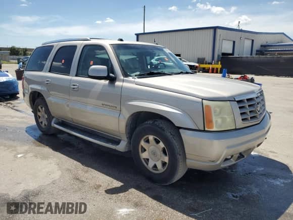 2004 Cadillac Escalade with VIN 1GYEC63T04R190626, listed as a Copart auction lot 68692315 with 222,062 mi miles and Salvage title. Bid and sale history available at DreamBid. Image 4.